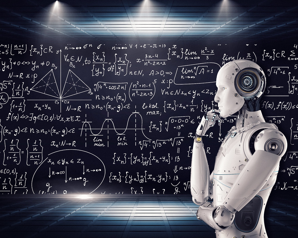A robotic mannequin standing thoughtfully in front of mathematical notation