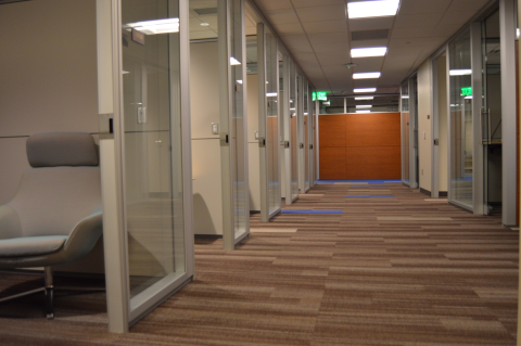 A hallway lined with focus rooms